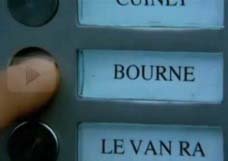 Jason Bourne ringing the bell of his apartment